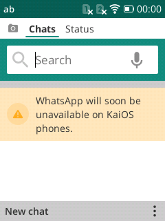 Screenshot of the yellow banner with a warning sign in WhatsApp's chat list, text says WhatsApp will soon be unavailable on KaiOS phones.